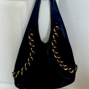 Michael Korrs soft leather satchel with hardware and key holder